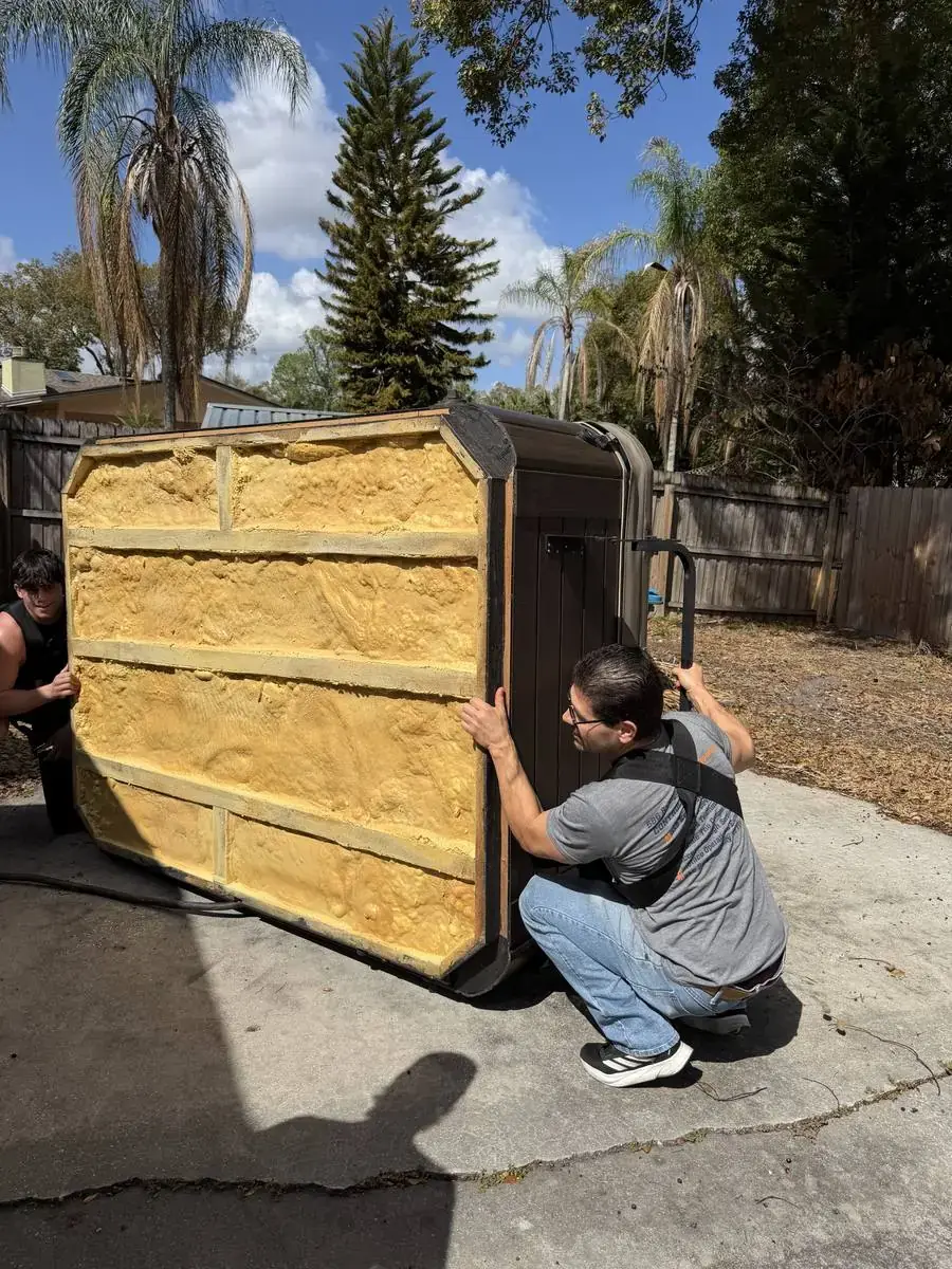 Toro Movers crew moving a spa hot tub on a residential Central Florida job